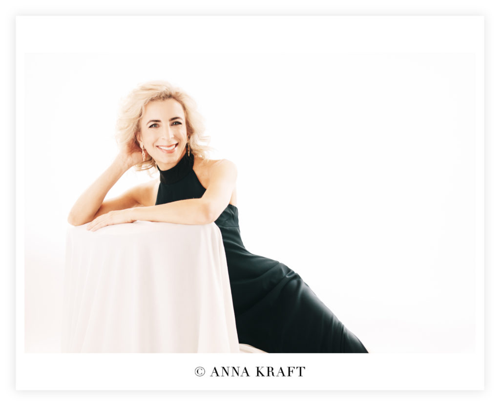 3/4 length of Dana in chair, smiling
30 over 30 photoshoot interview